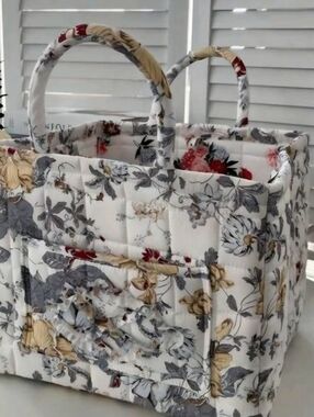 Quilted Floral Storage Tote in Cream and Gray. 13 Inches Wide 11 Inches Deep.
